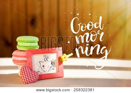 Morning Surprise, Colored Cakes Makarons With A Card. The Inscription Is A Good Morning. Sun Rays