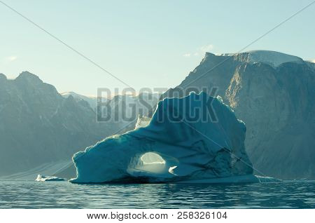 Hole Iceberg In The Arctic - Greenland