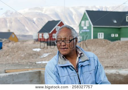 Ittoqqortoormiit, Greenland - September 9, 2012: Old Man Living In His Town On The Eastern Side Of T