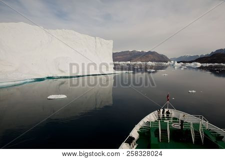 Icebergs And Expedition Ship - Scoresby Sound - Greenland