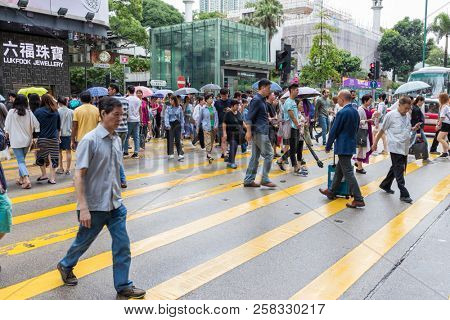 Tsim Sha Tsui, Hong Kong, 17 August 2018-: People crossing the road in Hong Kong