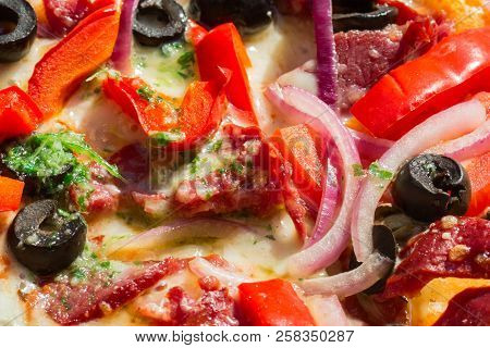 Bright Pizza With Shiny Vegetables And Meat Close-up