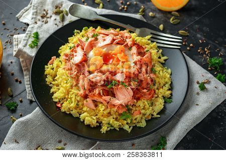 Traditional Indian-english Kedgeree Breakfast: Basmati Rice With Egg Benedict And Hot Smoked Sweet C