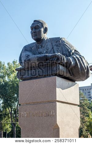 Almaty, Kazakhstan - September 15, 2018: Monument To Gabit Musrepov Near The Young Spectators Theate