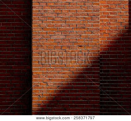 View At Brick Wall With Shadow. Real Hosue Brick Wall