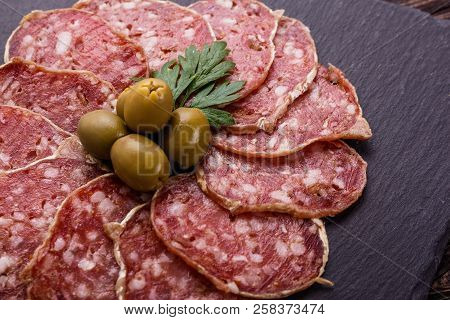 Saucisson Sec Delicious French Salami On A Wooden Background