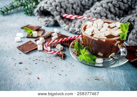 Homemade Hot Chocolate With Mint, Candy Cane And Marshmallow, Light Blue Background With Warm Blanke