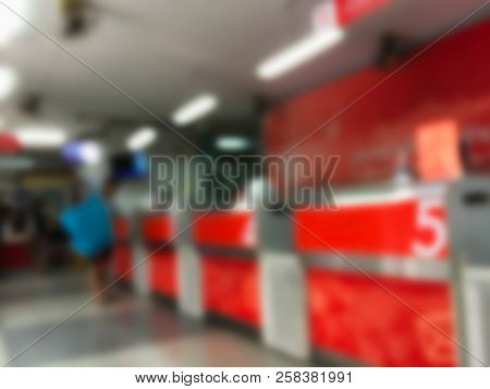 Blurred Red Color Background At Postoffice With People