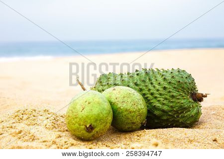 Exotic Fruit Sausep And A Wooden Apple