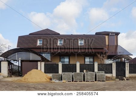 Beautiful Suburban Brick House With Large Mansard Under Construction