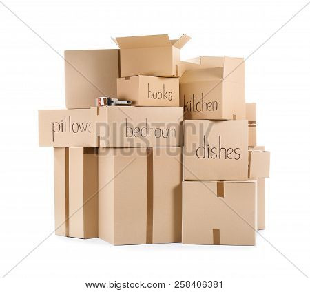 Moving Boxes And Adhesive Tape Dispenser On White Background