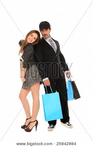 Joven hombre elegante y chica de compras