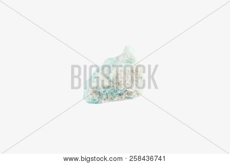 Bright Raw turquoise Amazonite from Brazil isolated. Macro photography. Mineralogy.