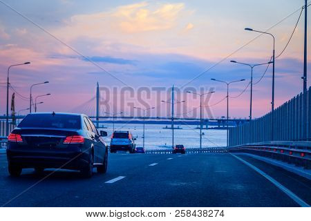 Whsd Bridge In St. Petersburg In The Evening At Sunset. High-speed Bypass Toll Road. Petersburg Brid