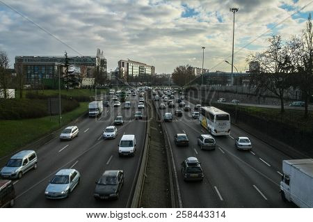 Paris, France - December 30, 2007: Cars Passing By On The Boulevard Peripherique Ring Road Of Paris 