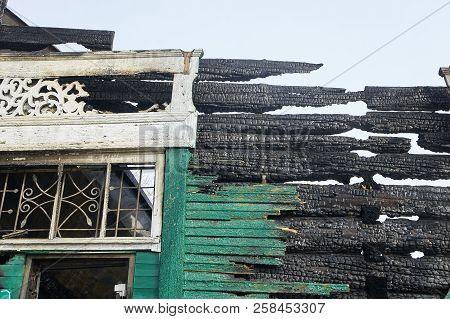 Demolition House Using Excavator In City. Rebuilding Process. Remove Equipment