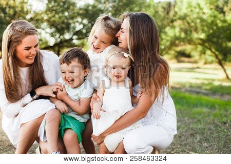 A Large Family With Homosexual Parents. Two Mothers.