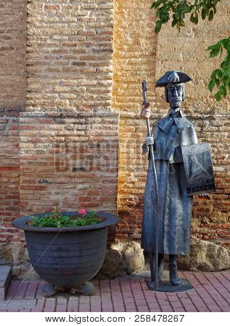 Modern Camino Pilgrim Statue In Front Of Albergue Cluny - Sahagun, Castile And Leon, Spain, 18 Septe