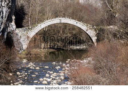 Landscape Of Ancient Bridge Of Kontodimos Or Lazaridis In Vikos Gorge And Pindus Mountains, Zagori, 