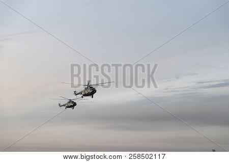 Military Helicopter Mi-8 In The Cloudy Sky