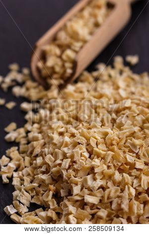 Fragrant Dried Parsnip On A Dark Stone Background
