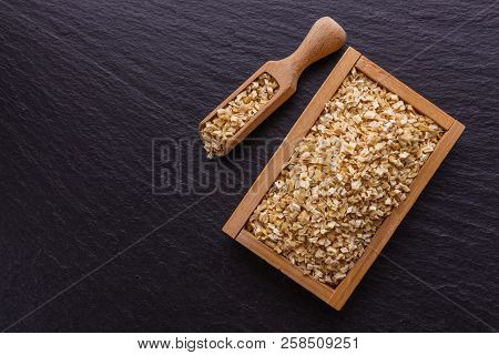 Fragrant Dried Parsnip On A Dark Stone Background