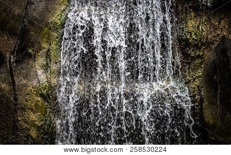 Close Up Splash Water Sence On Wet Rock For Background. Beauty In Nature Background