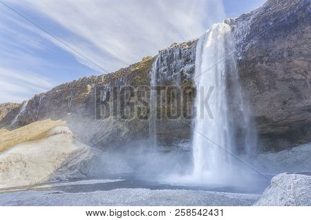 Seljalandsfoss Waterfall (iceland) In A Frozzen Day.