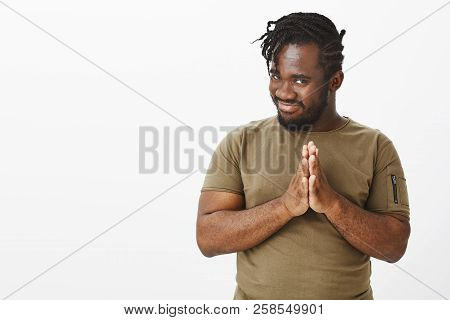 Guy Rubbing Palms, Having Nasty Evil Plan. Intrigued Funny African-american Man In Olive T-shirt, Ho