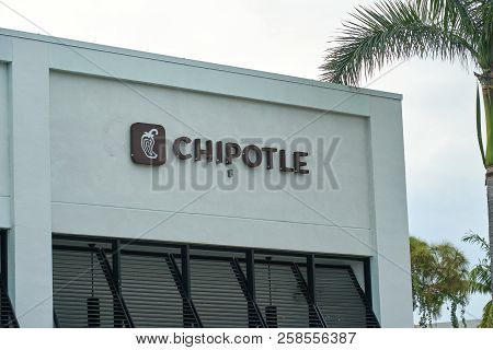 Miami, Usa - August 22, 2018: Chipotle Restaurant Logo. Chipotle Mexican Grill Is An American Chain 