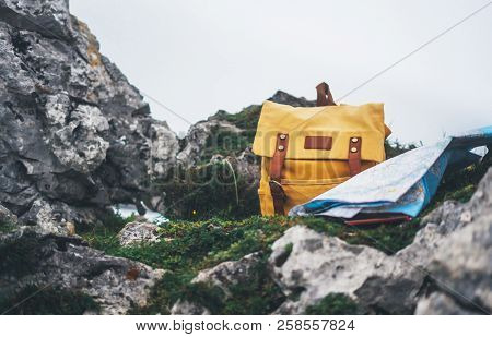 Hipster Hiker Tourist Yellow Backpack And Map Europe On Background Green Grass Nature In Mountain, B