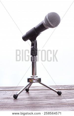 Grey Mini Microphone On Stand. Professional Microphone On Short Rack Stand, Vertical Image. Modern T