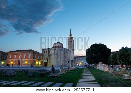 Zadar, Croatia - July 2 2018: Zadar, Croatia At Sunset With The Ancient Church Of St Donat And Antiq