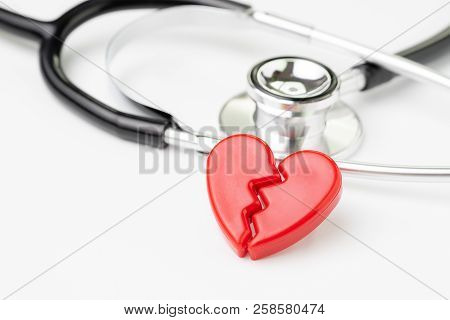 Heart Attact Or Broken Heart Concept, Cute Read Heart Break With Medical Stethoscope On White Backgr