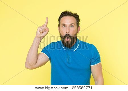 Surprised Man With Open Mouth Keep Finger Pointing Up. Beraded Man Surprised With Epiphany And Sudde