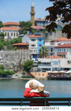 A tourist enjoys the view in Amasra - Amasra is a small sea resort town in Bartin - Blacksea region / Turkey