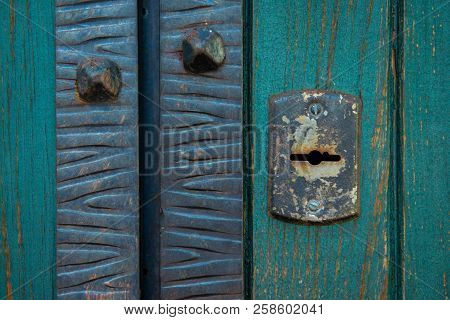 Old Rusty And Dusty Keyhole Wallpaper. Vintage Keyhole On Old Wooden Door Background. Keyhole Of Old
