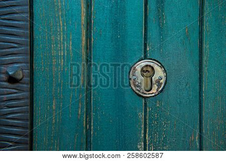 Old Rusty And Dusty Keyhole Wallpaper. Vintage Keyhole On Old Wooden Door Background. Keyhole Of Old