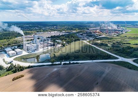 Cement Factories, Smoking Pipes And A Plume Of Dust. Bird's Eye View