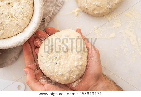 Hands Holding Dough Ready For Baking, Closeup, Copy Space.