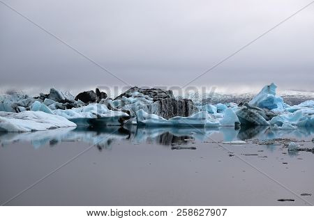 Iceland, Icebergs At Jökullsárlón Glacier Lagoon On  A Misty Summer Evening