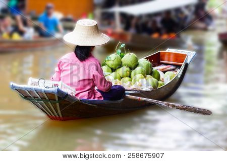 Damnoen Saduak Floating Market, Thailand Small Boats Laden With Colourful Fruits And Vegetables And 