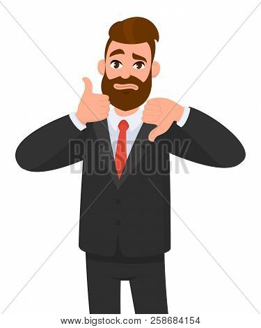 Young Business Man Showing Thumbs Up And Thumbs Down Gesture. Like And Dislike. Agree And Disagree. 