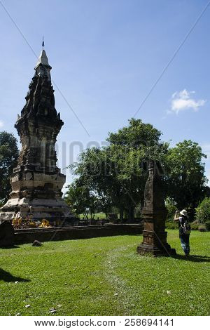 Thai Woman Travel Visit And Respect Praying Chedi Or Stupa Phra That Kong Khao Noi In Yasothon, Thai