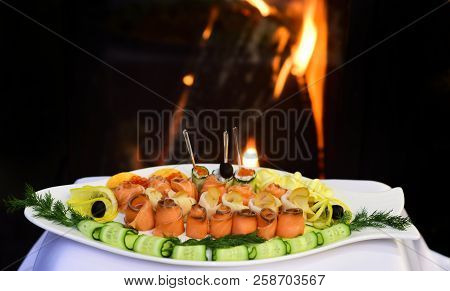 Assorted Fish Platter With Lemon And Cucumber. Serving Fish Platter Of Organic Redfish And Whitefish