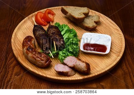 Fast Food. Eastern Food. Dishes Of Oriental Cuisine Lying On Board And Decorated With Vegetables And
