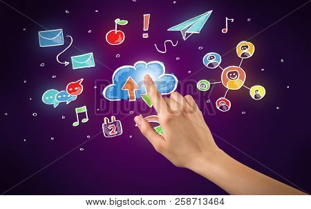 Female hand toucing mixed media icons with purple background