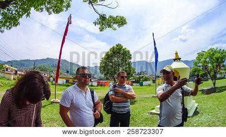 Pokhara, Nepal - April 10, 2018: The People Near Stoned Sculpture Of Namgyal Chorten At Nepal