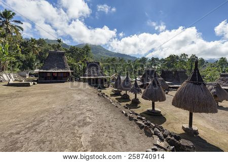 Terraced Levels Of The Luba Traditional Village With Ngadhu Poles On The Slopes Of Mount Inerie In F