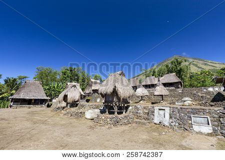 Traditional And Western Beliefs Mingle In The Courtyard Of The The Luba Tradtional Village On The Sl